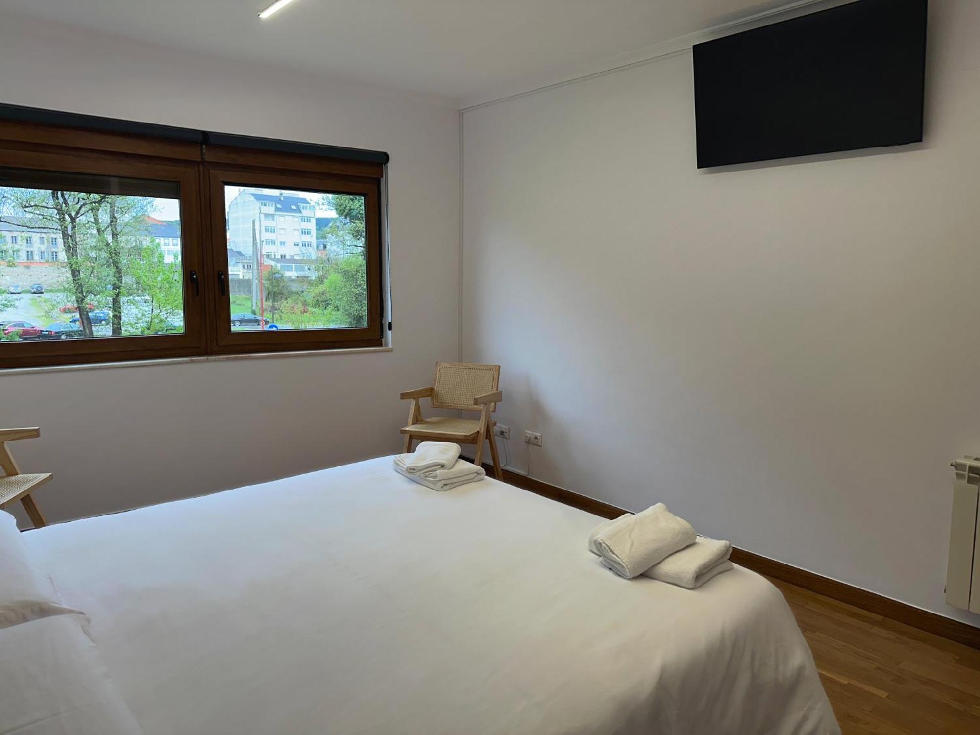 Pension Rio Sarria Buitenkant foto